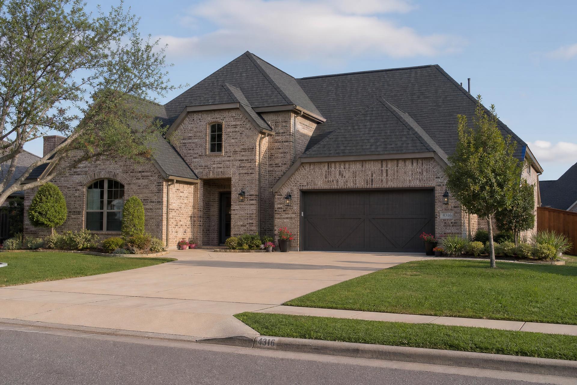 Two-story Dallas-Fort Worth home with a newly replaced asphalt shingle roof
